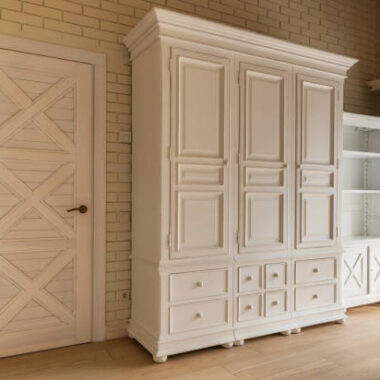 White classic wooden wardrobe in cottage house